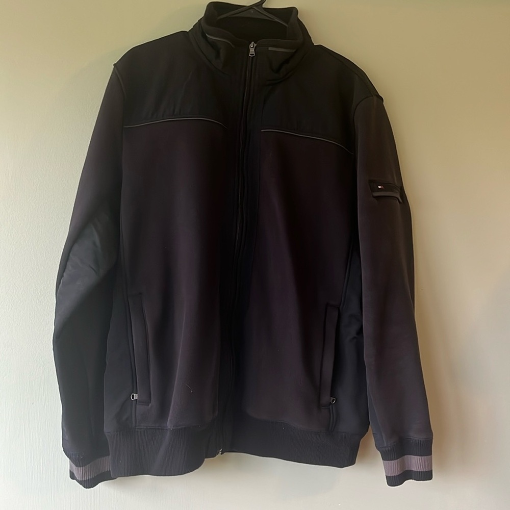 Men’s size Large black mid weight Tommy Hilfiger fleece lined jacket.